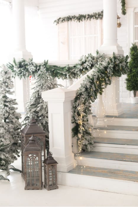 Christmas lanterns at the stairs of the house