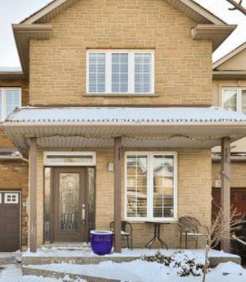 house with small porch and seating area